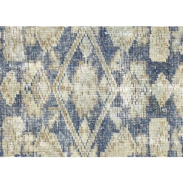 1940s Persian Tabriz Rug. Hand woven in the Tabriz region of Northern Iran. Distressed and refinished in the U.S. The...