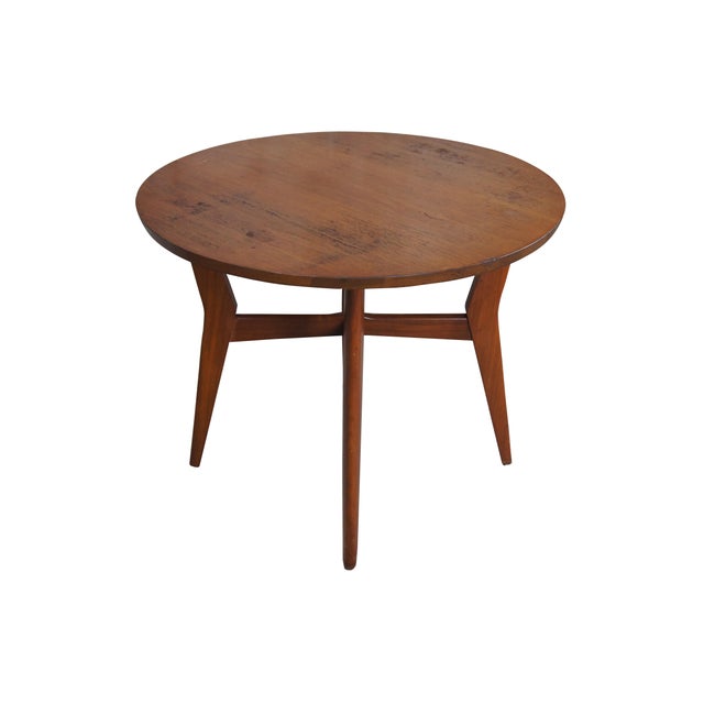 Mid Century Scandanavian style side table by Mersman. Features a round form crafted from walnut with contoured boomerang...