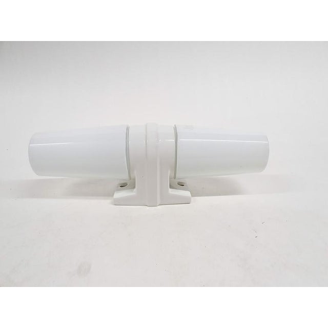 White glass and ceramic wall light by Sigvard Bernadotte for IFO. In good condition Sigvard Bernadotte I have official...