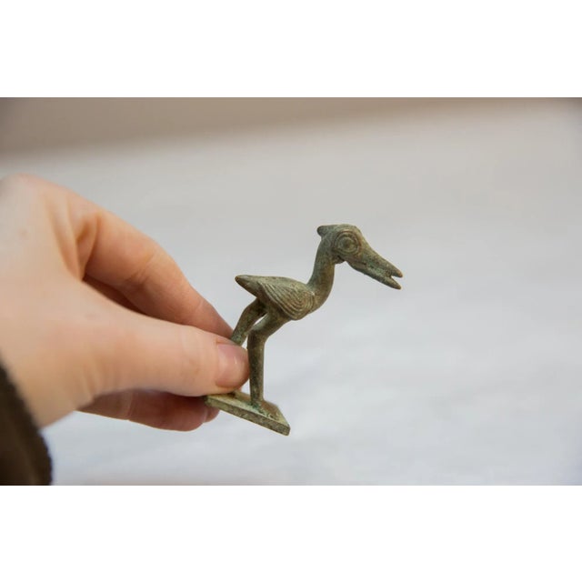 Vintage handmade African oxidized bronze stork. Circa mid 20th century and possibly older, this piece has such incredible...