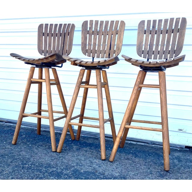 Mid Century Arthur Umanoff Style Slatted Wood Counter Stools. 1950's. Stools have beautiful slat wood backs and seats,...