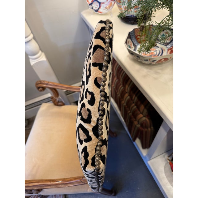 This is a French Louis XIV style armchair. The wood is walnut. The Wood has a lovely carved detail. The upholstery is new...