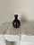 Miniature tenmoku black-glaze studio bud vase with white slip-trailed streaks, late 20th century. Good vintage condition.