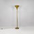 Italian mid-century modern, art deco style entirely brass floor lamp, 1940s. Art Deco floor lamp with a round base, with...