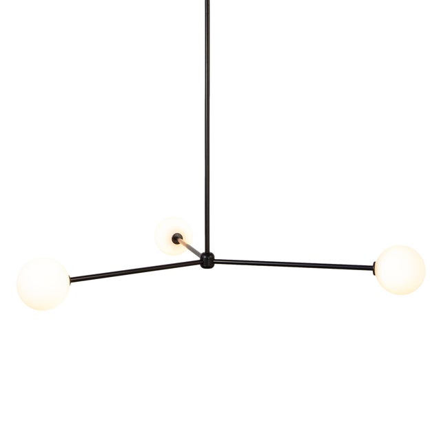 Three orbs, infinite mood. The Globe 3 floats in sync - bright, balanced, and a little bit fun.