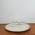 Round dish / Cake dish "La Colombe", 1950/60 Brutalist style, brown, beige, green spots La Poterie de la Colombe is a...