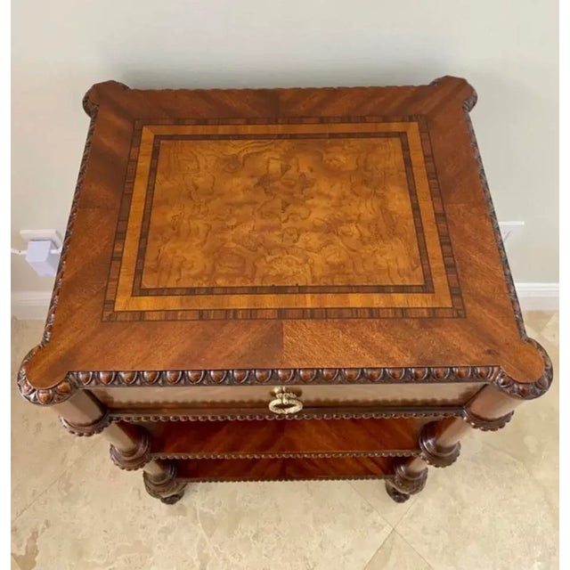Maitland Smith mahogany finish on satinwood aged regency three tiered occasional table with drawer. Delicate scrolled...