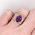 This gorgeous statement ring has an elaborate split shank design and features a gorgeous 10x8mm oval amethyst from Uruguay...