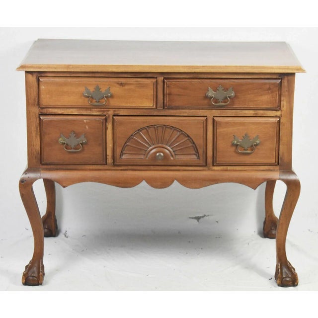 Bench made solid mahogany chippendale style lowboy in the williamsburg style. Lowboy features proportioned fluted quarter...