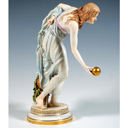 Extremely decorative, fully sculptural representation of an art nouveau beauty in a softly falling robe, tilted forward to...