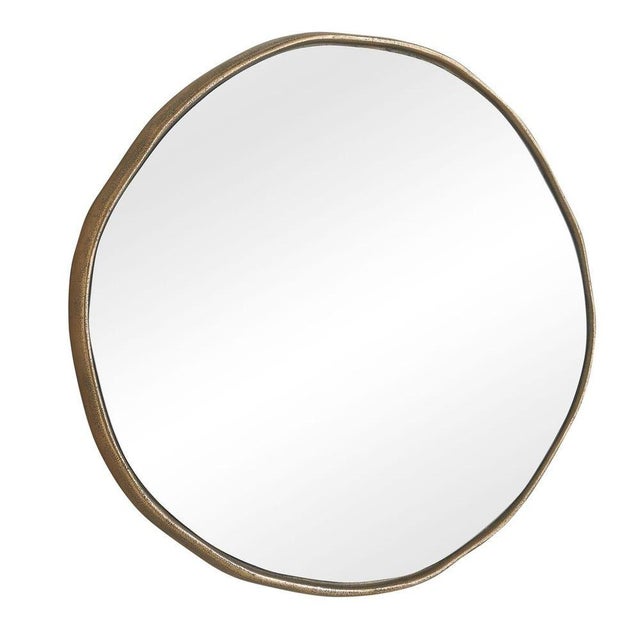This unique shapely large 'organic' Round Mirror showcases a perfectly imperfect silhouette. Aluminum cast frame has...