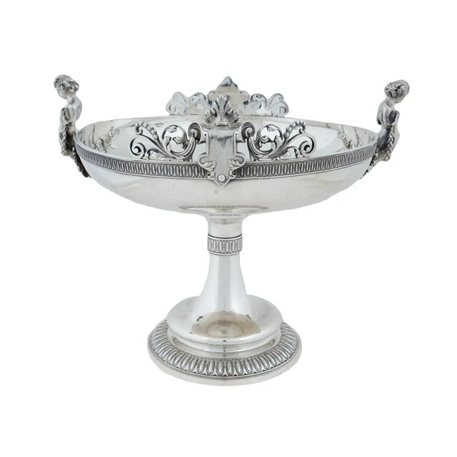 An exceptional quality antique Tiffany and Co. sterling silver centerpiece constructed of numerous castings assembled...