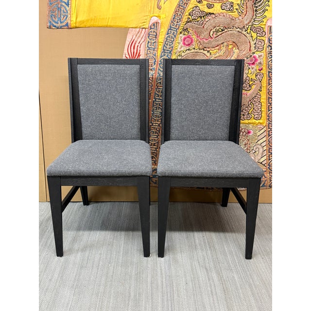 Design Plus Gallery presents a Pair of Dina Upholstered Side Chairs from International Atelier. They have a black rubber...