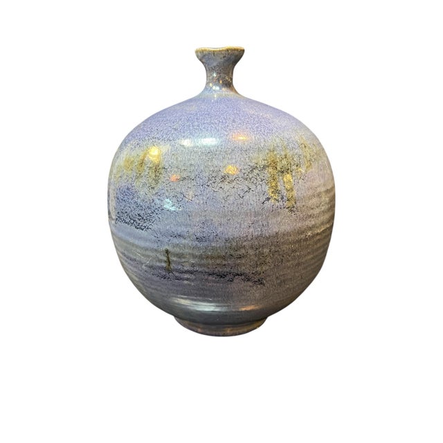 Vintage Signed Studio Pottery Vase by Strini A sophisticated vintage studio pottery vase signed “Strini,” featuring a...