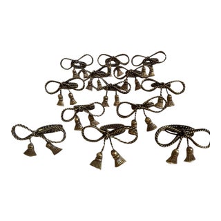 Vintage Mid Century Regency Brass Tassel Bow Napkin Rings Set of 13 For Sale