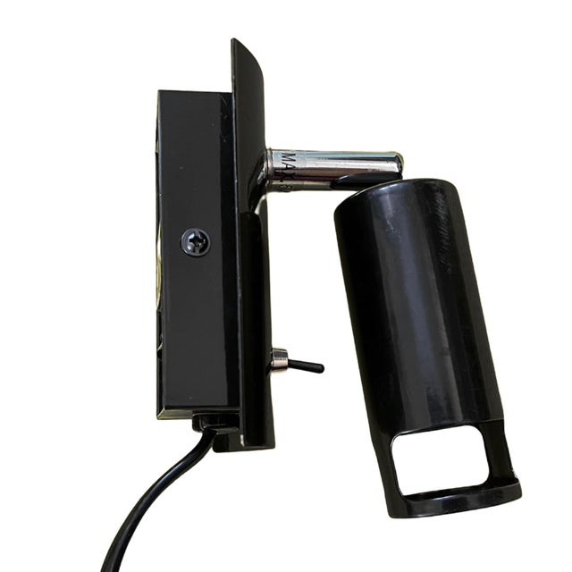 Minimalist wall lamp or bedside lamp 7385 in the future style, manufactured in Germany in the 1980s by Nordlux. The lamp...