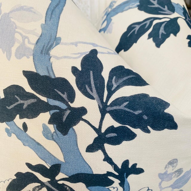 Offering a set of four lovely blue and white floral pillows ,with matching fronts and varying sections of the print on the...