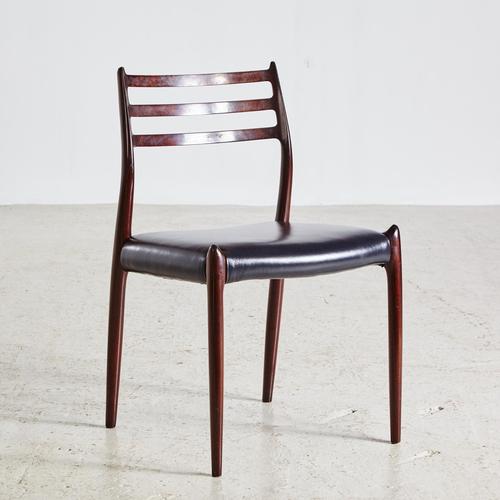 Pretty Danish Mid-Century modern chairs with new black leather upholstery from the 1960s This piece has an attribution...