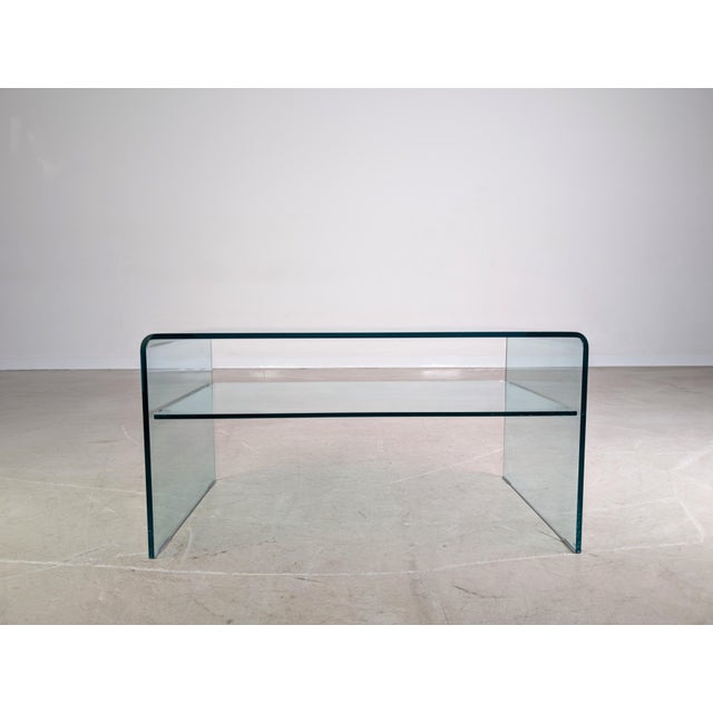 We are offering for sale a beautiful curved glass coffee table by Sovet Italia. The table features high-quality...