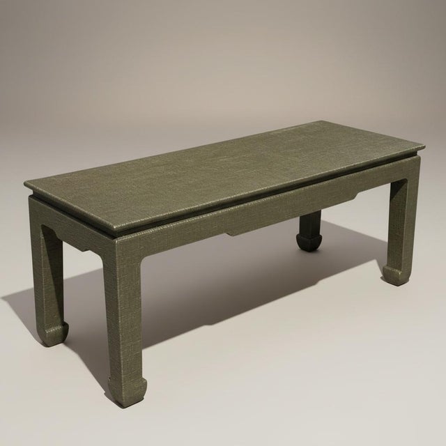 This is an organic modern grasscloth wrapped console table with Iconic Karl Springer styling. It is newly lacquered in a...