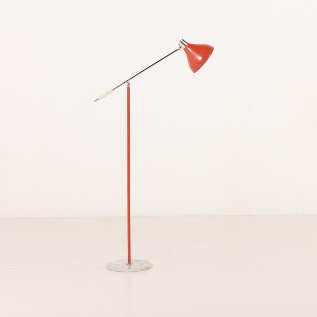 Italian floor lamp by Stilux Milano, produced in the 1970s and representing the bold, functional aesthetics of mid-century...