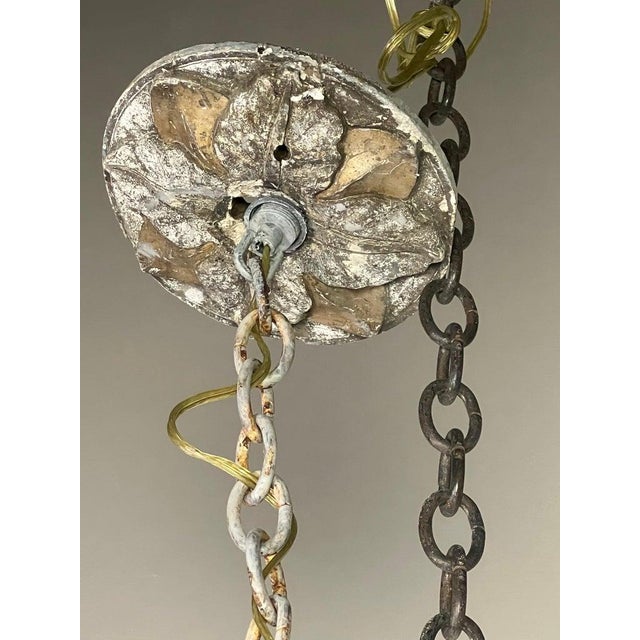 Monumental size eight light wood & iron chandelier. The chandelier is painted a dove gray coloration. The iron has...