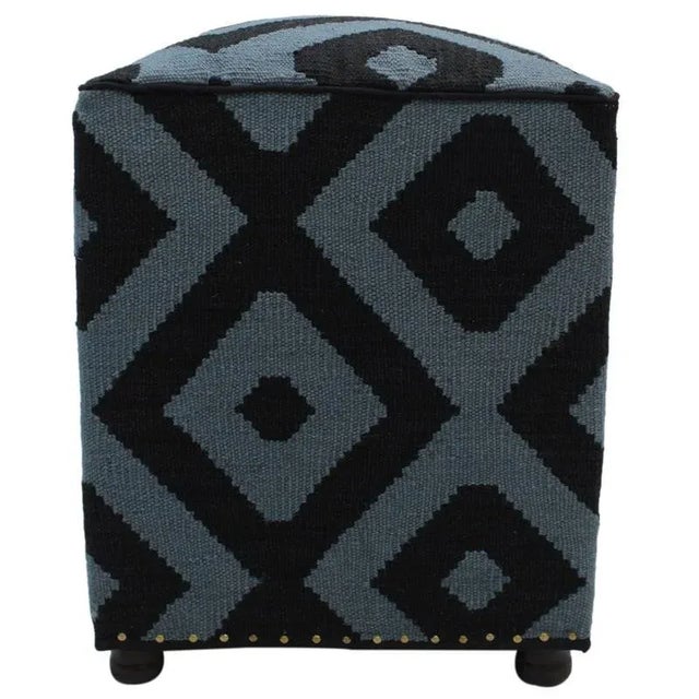 Chic handmade ottoman crafted using wood and upholstered using hand-woven kilim wool rug is a multi-purpose fashion pouf...