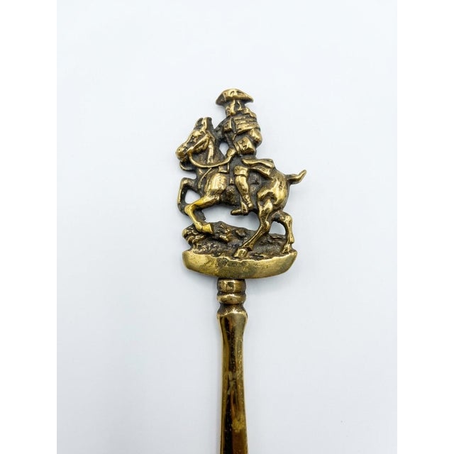 Add a dash of historic intrigue to your desk or library with this vintage solid brass letter opener featuring the infamous...