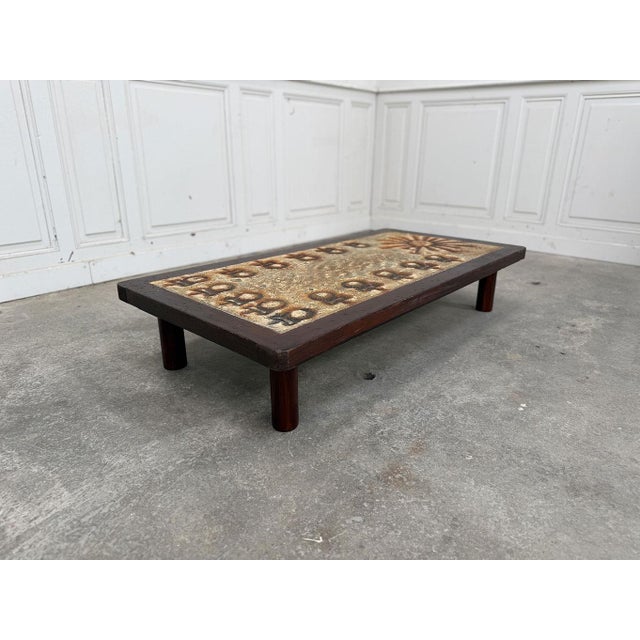 An enameled lava top, stylized flowers, and that famous sun: François Chaty's signature style is instantly recognizable....