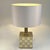 Geometric table lamp in brass and chrome by Gioielleria Stefano Bono Spadafora 1970's, has a square base of woven strip of...