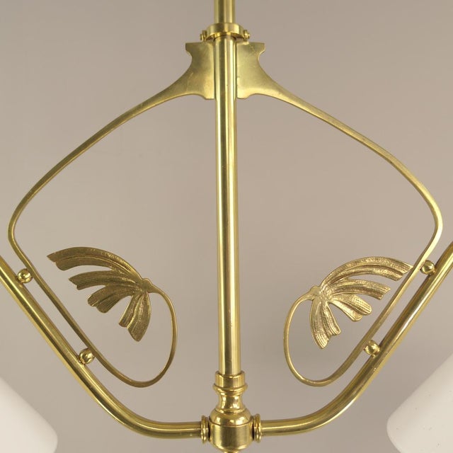 Hanging lamp for the dining or game table. The lamp with its floral motifs is a typical example of the era of Art Nouveau....