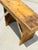 A charming antique Hungarian pine bench featuring a beautifully timeworn patina and simple provincial craftsmanship....