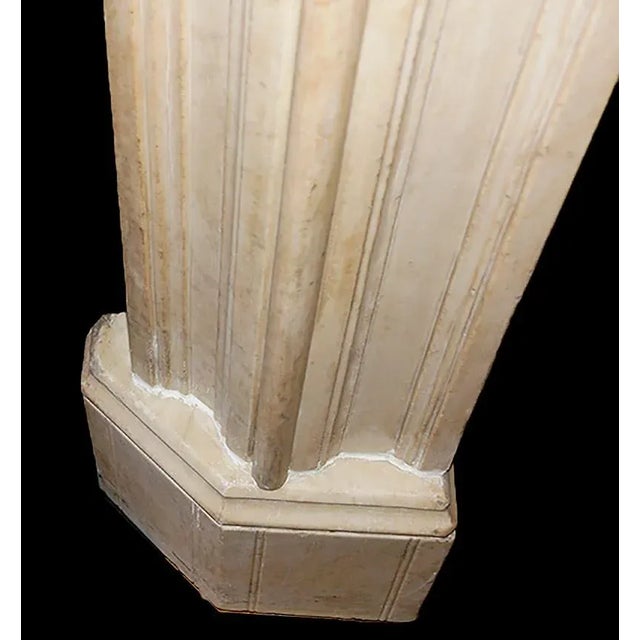 Antique Gothic Revival style carved Carrara marble mantel having paneled and cusped motifs on jambs and spandrels,...