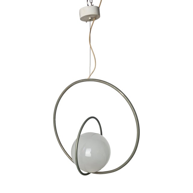 Rotatable Pendant Lamp in Burnished Brass and Glass Sphere by Pia Guidetti Crippa for Lumi, 1970s For Sale