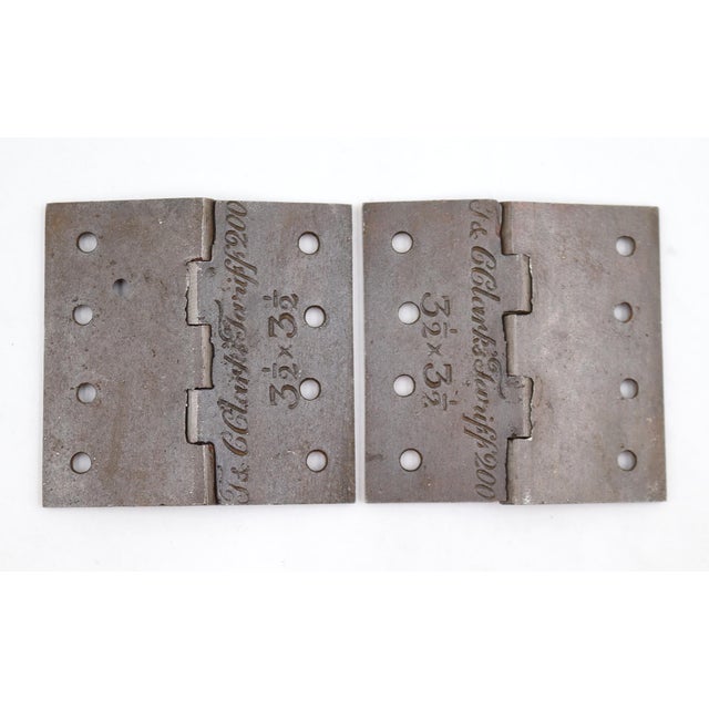 Pair of door hinges made by T. & C. Clark & Co., established in 1795 by brothers Thomas and Charles Clark in...