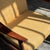 This mid-century easy chair embodies the clean lines and functional elegance of the Danish Modern movement. It features a...