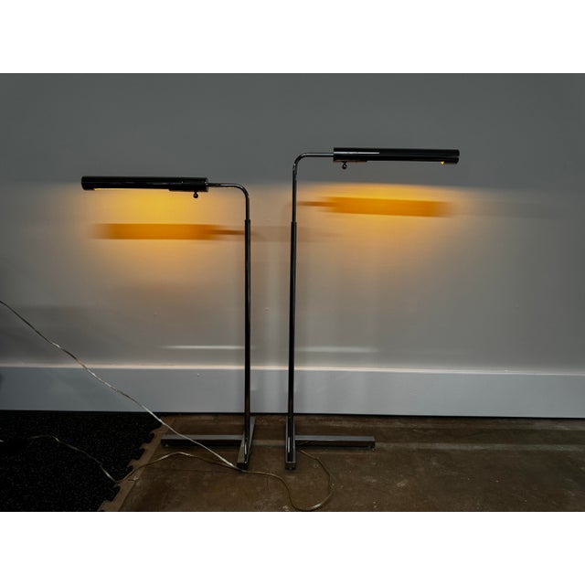 pair of MCM CASELLA chrome telescoping floor lamps. These lamps are telescoping for height and both work perfectly. Lights...