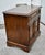 Vintage Nightstand has a Regency Style. Made by Drexel Furniture. The Material is Wood. One Drawer and two Drawers. The...