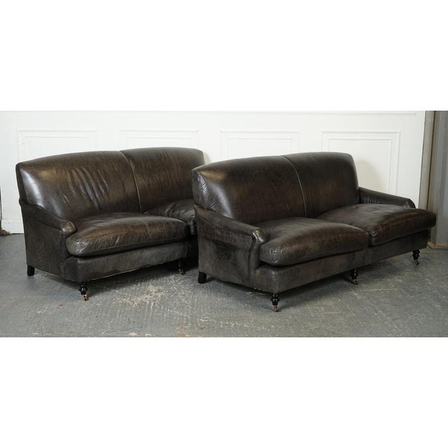 Exquisite Howard Style Three Seater Sofa. The Howard-style Heritage Grey Leather Sofa is a truly exquisite piece of...