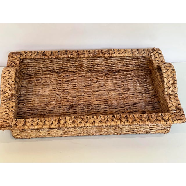 Beautiful basket tray with handles. This appears to be a very sturdy basket with good strong handles to carry. Tis misght...
