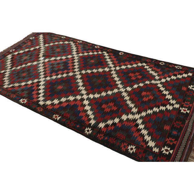 Handwoven in wool and originating from Turkey 5x10 circa 1950-1960, its polychromatic colorway enjoys a quite traditional...