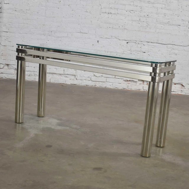 Stunning modern chrome rectangle console table or sofa table with glass top in the style of Pace or Karl Springer....