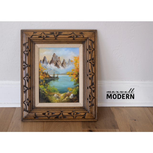 Gorgeous vintage small landscape painting featuring a very picturesque nature scene showcasing high-peaked mountains and a...