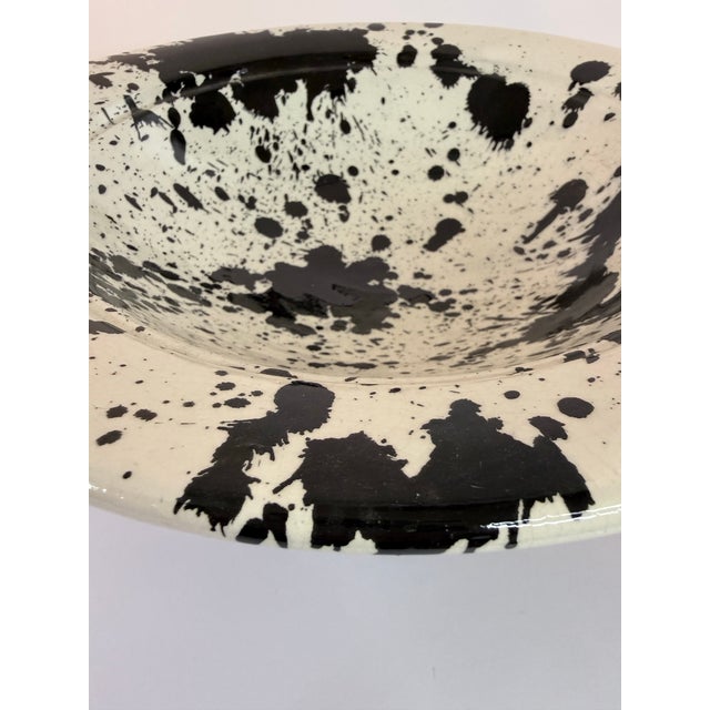 Elevate your tabletop or hang all for a collection display with this striking terra cotta bowl, artfully finished with...