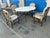 Kreiss Capri table and chairs. Set includes travertine table with base and 4 chairs. The top is honed filled. The chairs...