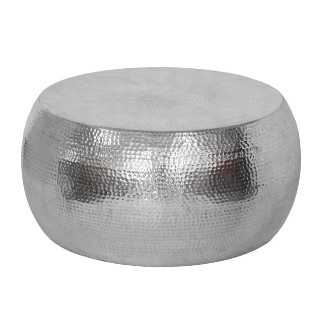 The Eclipse Coffee Table is defined by its smooth rounded form and luminous chrome finish. Crafted from stainless steel,...