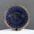 A large Spanish hand-painted earthenware lebrillo bowl executed in the traditional Fajalauza style. The bowl is decorated...