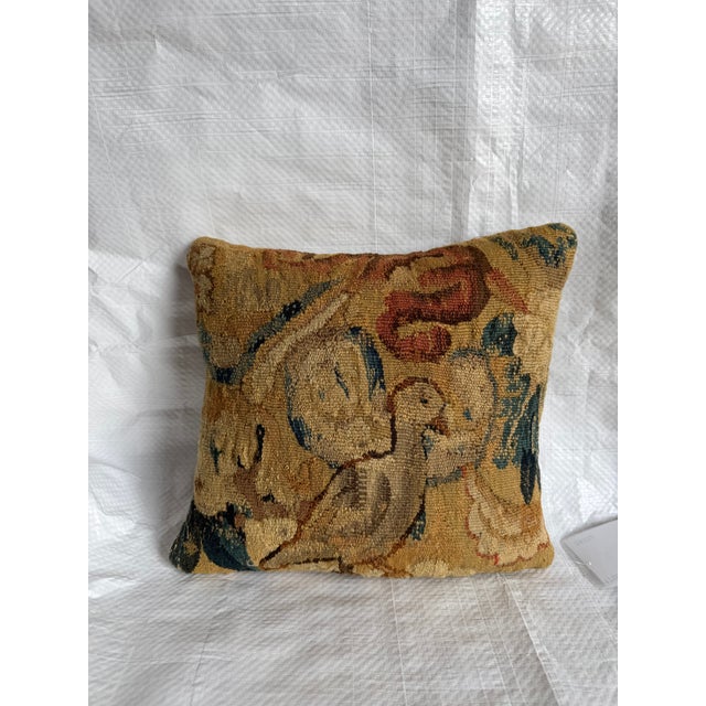 This museum-quality decorative pillow preserves a rare section of an authentic 17th Century Brussels tapestry depicting an...