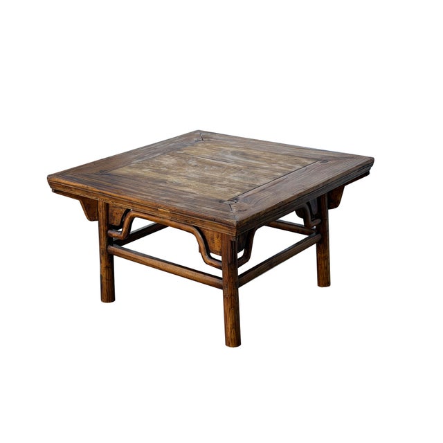 Embrace the timeless elegance of traditional Asian craftsmanship with this exquisite antique Chinese square coffee table....