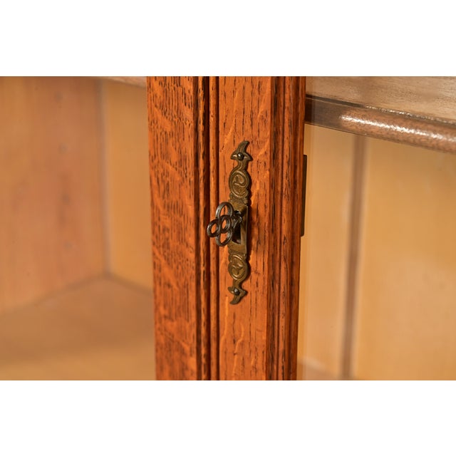 Brown Antique Victorian Carved Oak Two-Door Bookcase Cabinet | Circa 1920s For Sale - Image 8 of 13